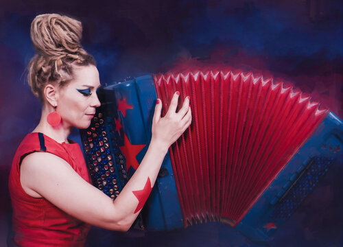 Female artist playing the accordian.
