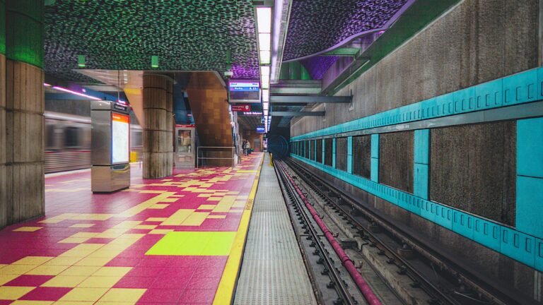 Subway station decorated with tiles and lights in bright colors