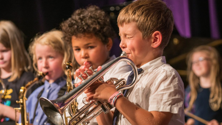 Kids playing jazz instruments.