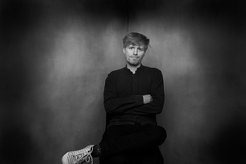 Svartvit porträttbild av Emil Nørgaard Munk