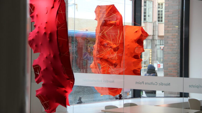 Artwork by Pia Männikkö in the window of Nordic Culture Point